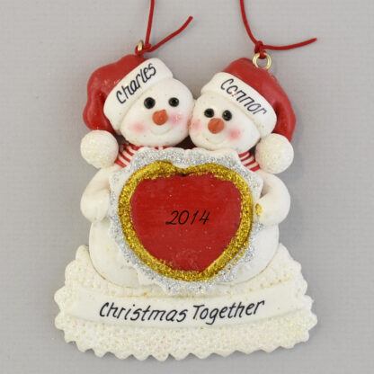 Snowmen Holding Heart Partners personalized Christmas Ornaments