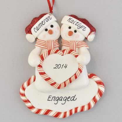 An Engaged Snow Couple Personalized Christmas Ornaments
