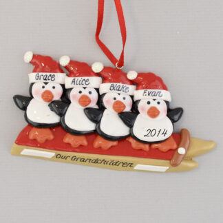 Grandchildren 4 Penguins Sledding Personalized christmas Ornament