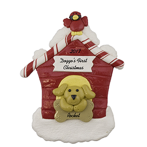 handmade Christmas ornament with a happy yellow dog in a red doghouse 